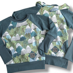 Load image into Gallery viewer, Teal mountains pocket pullover/hoodie
