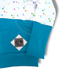 Load image into Gallery viewer, Teal paint splatter hoodie
